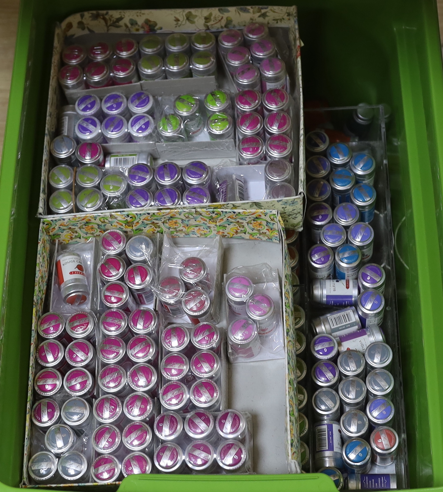 A collection drawing and calligraphy inks (for dipping pens) and ink cartridges in a variety of colours for fountain pens